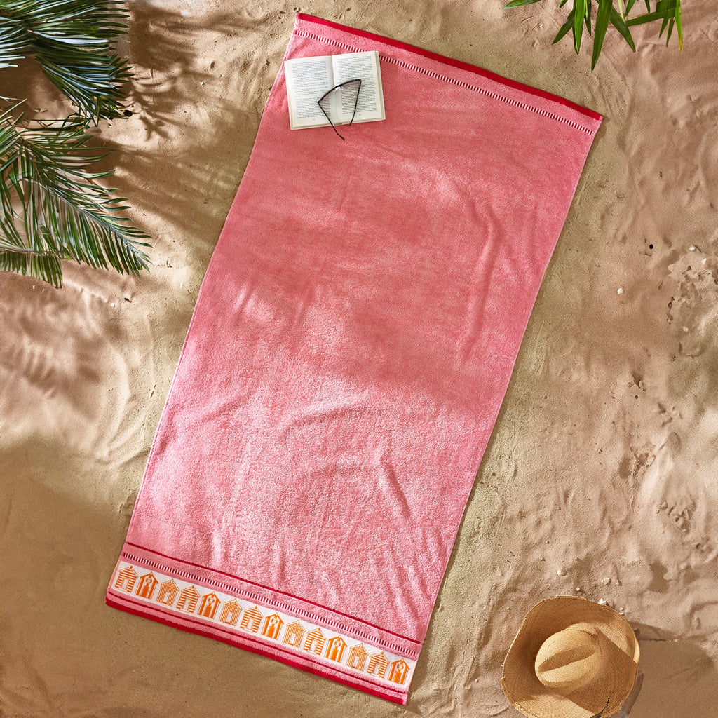 Beach Huts Cotton XL Beach Towel in Coral by Catherine Lansfield