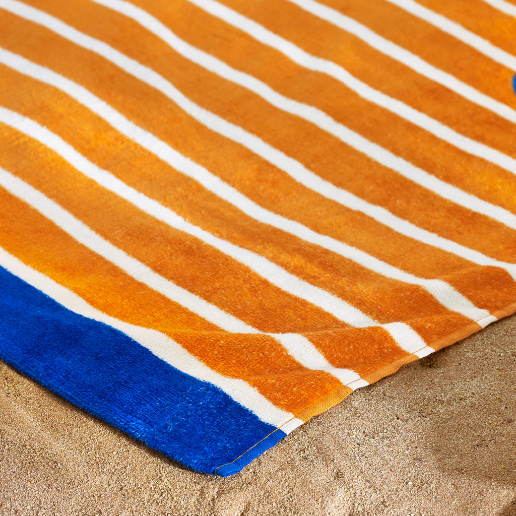Hot Dog Cotton Beach Towel in Orange by Catherine Lansfield