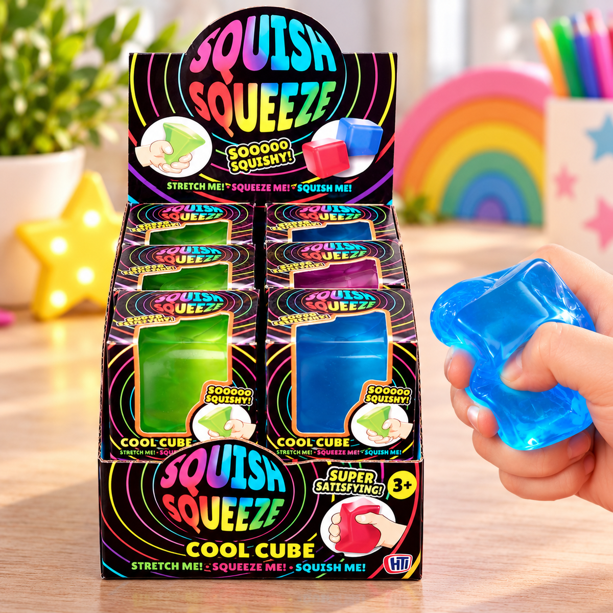 Squish Squeeze Cool Cube 5cm sensory fidget toys in assorted bright colours, featuring soft, stretchy, squeezable cubes.