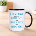 Funny resting bitch face ceramic mug with black handle and interior, turquoise and black sweary quote, printed by South Shore Gifts.