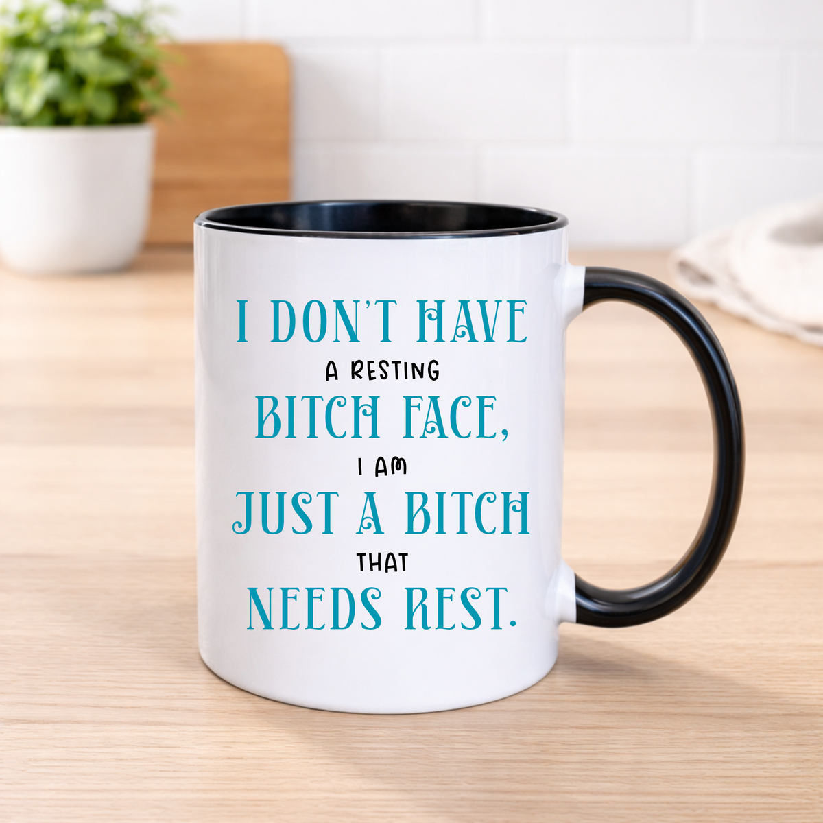 Funny resting bitch face ceramic mug with black handle and interior, turquoise and black sweary quote, printed by South Shore Gifts.