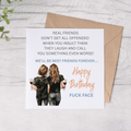 Birthday card with two people holding wine glasses and humorous text on a white background.