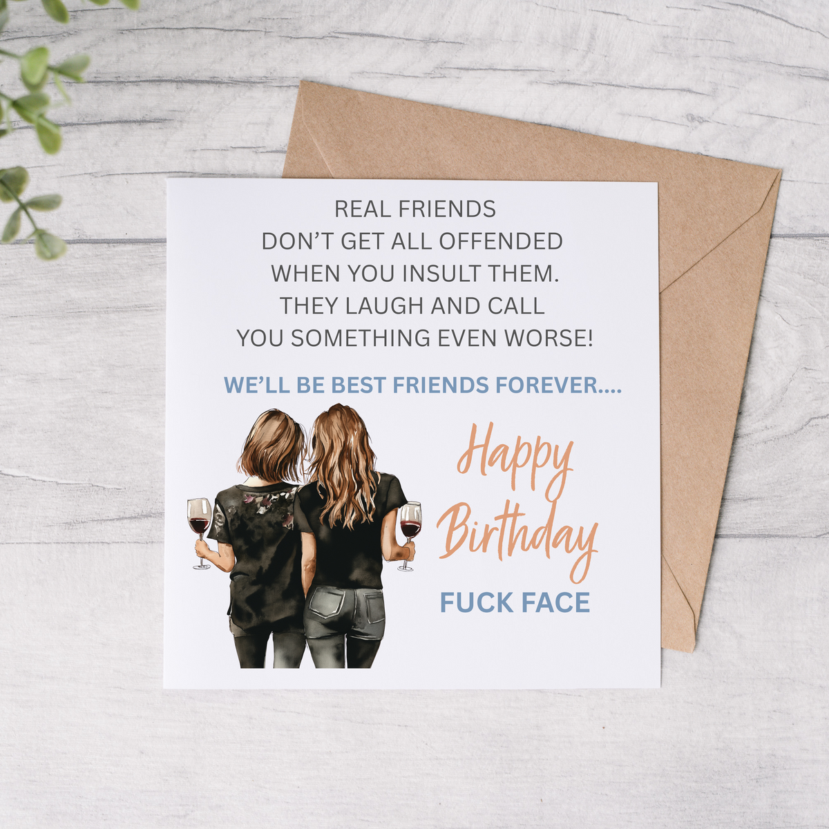 Birthday card with two people holding wine glasses and humorous text on a white background.