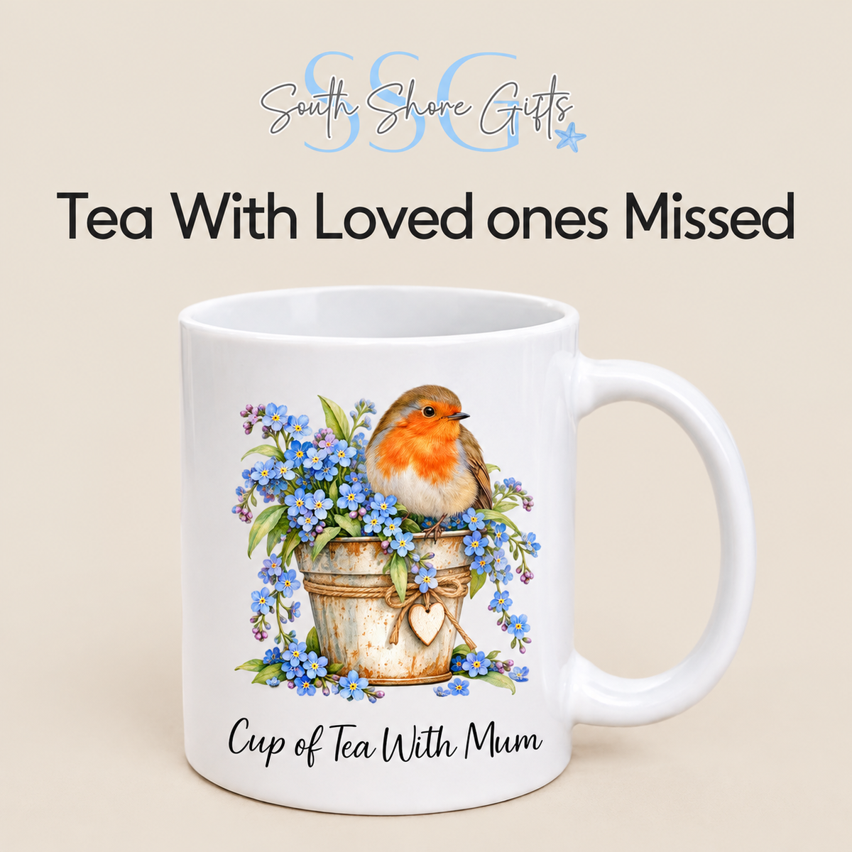 White ceramic memorial mug featuring a watercolour robin perched on a flowerpot of blue forget-me-nots, with the wording Cup of Tea With Mum. Designed and printed by South Shore Gifts.